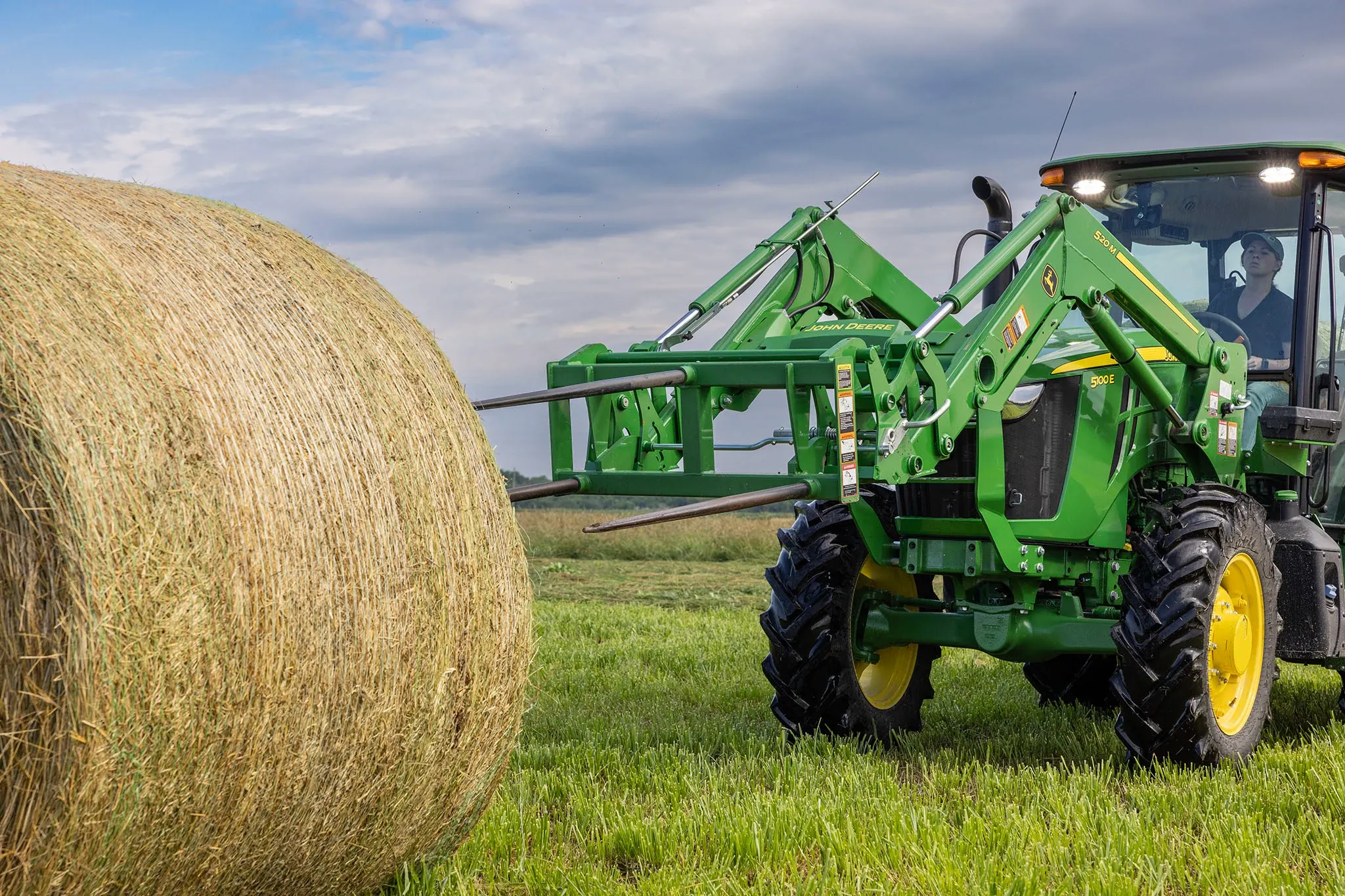 AB12 bale spear with bale in field