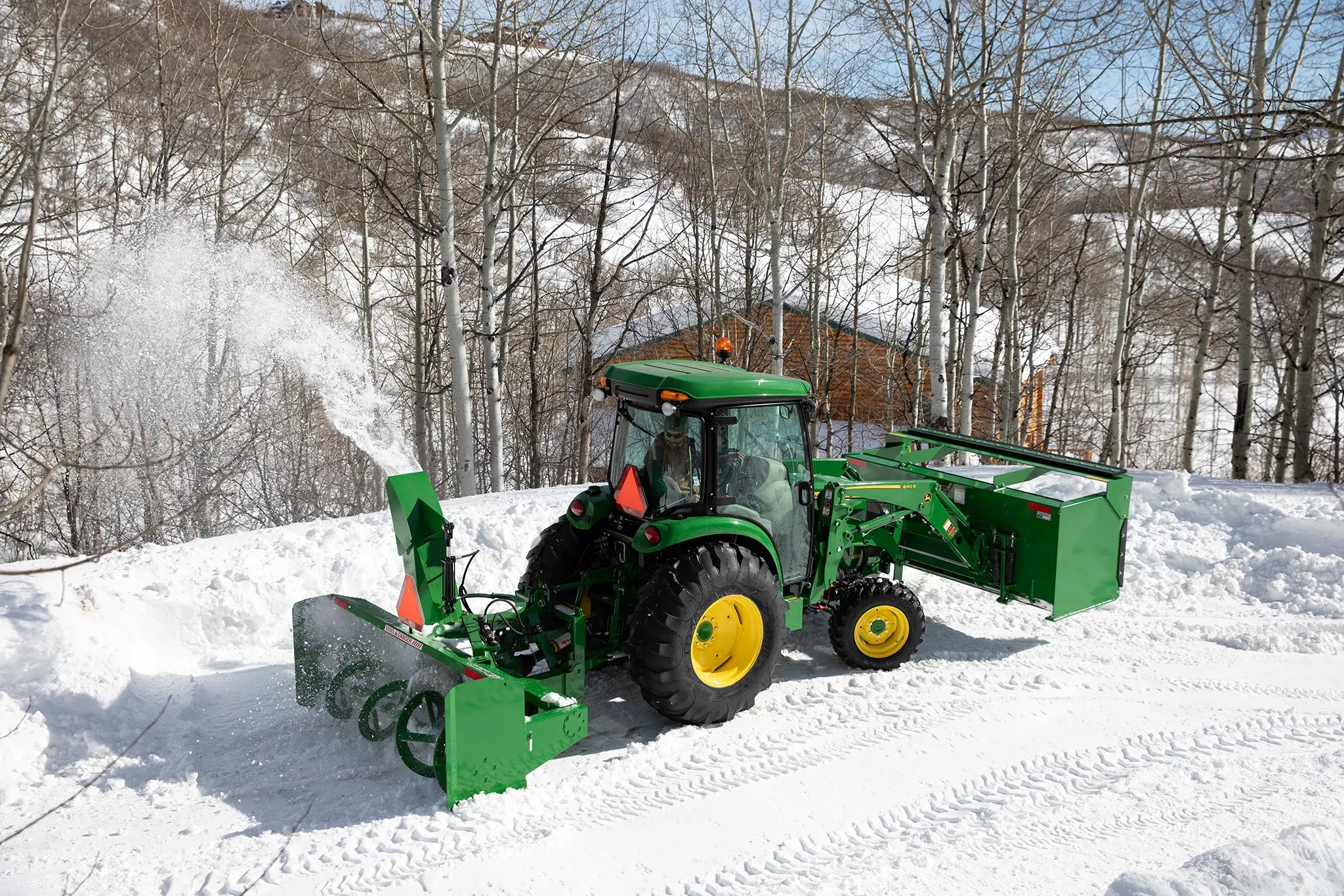 Blowing snow using a SB1184 Snowblower on 4066R Tractor