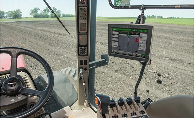 In-cab view of steering wheel and display