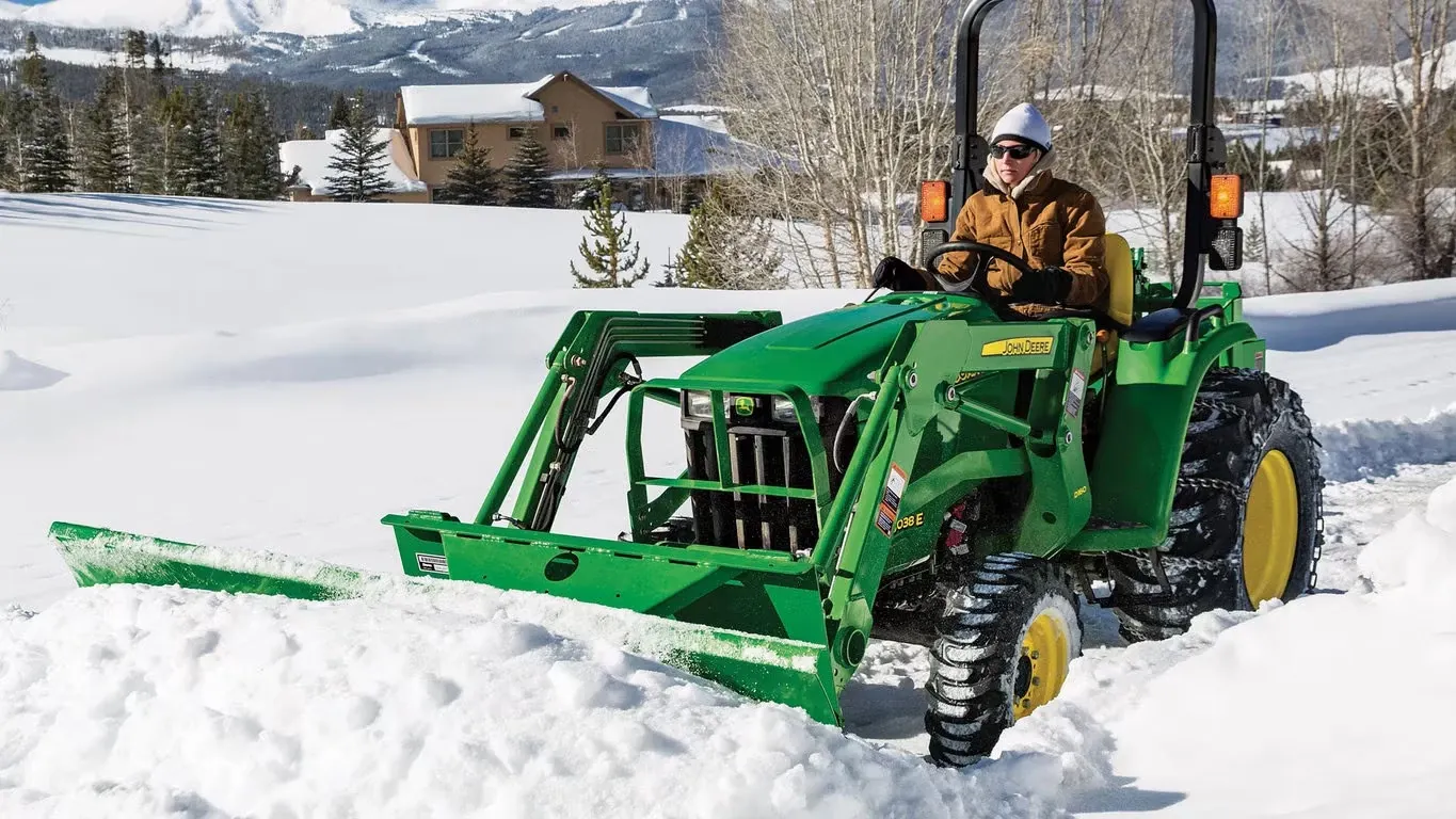 AF11G Front Blade clearing snow