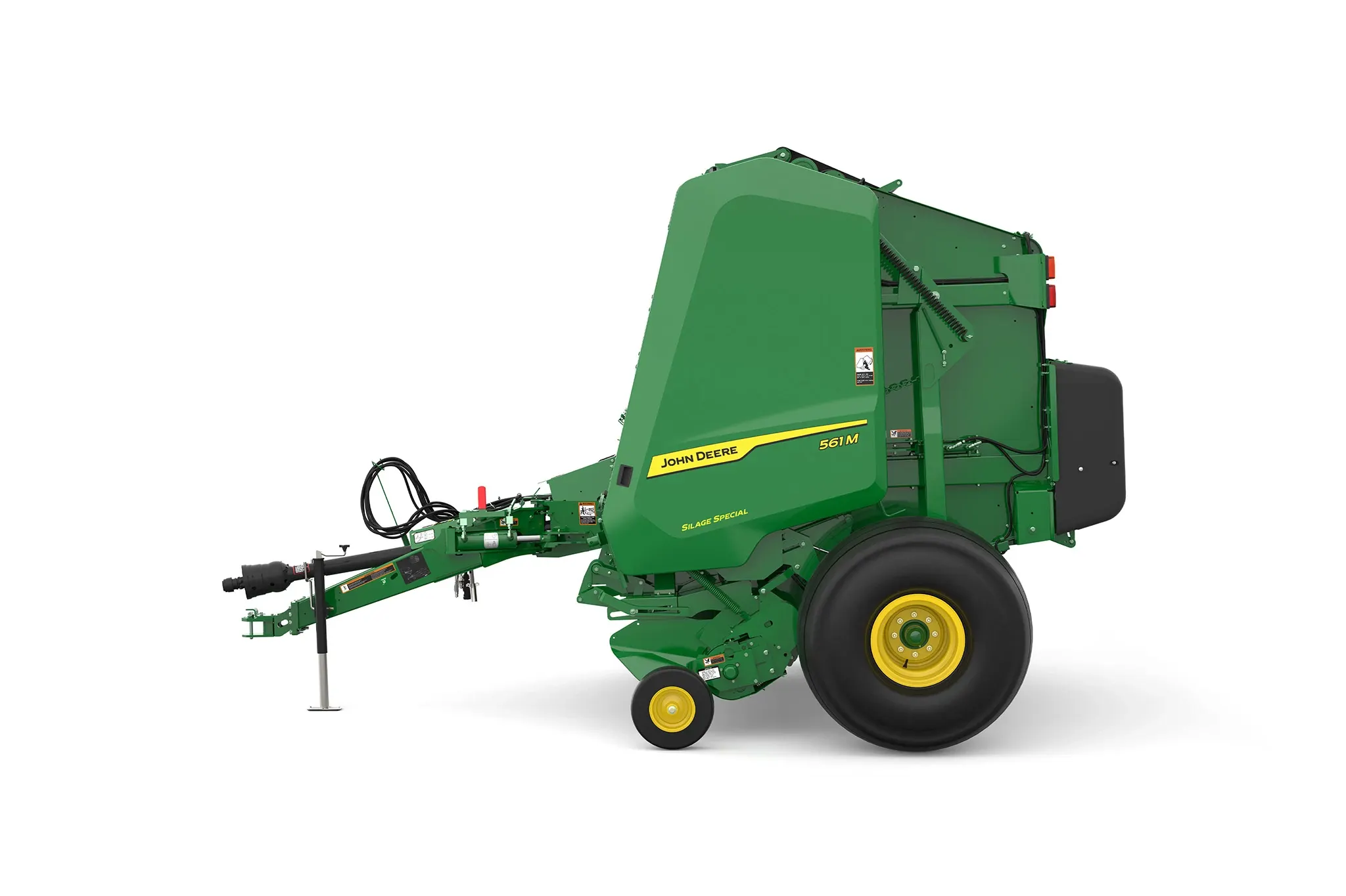 Studio rendering of 561M Silage Special round baler shown in left-side profile on a white background, featuring a green body, yellow wheels, enclosed pickup assembly, rear bale chamber, hydraulic hoses, and front tow hitch