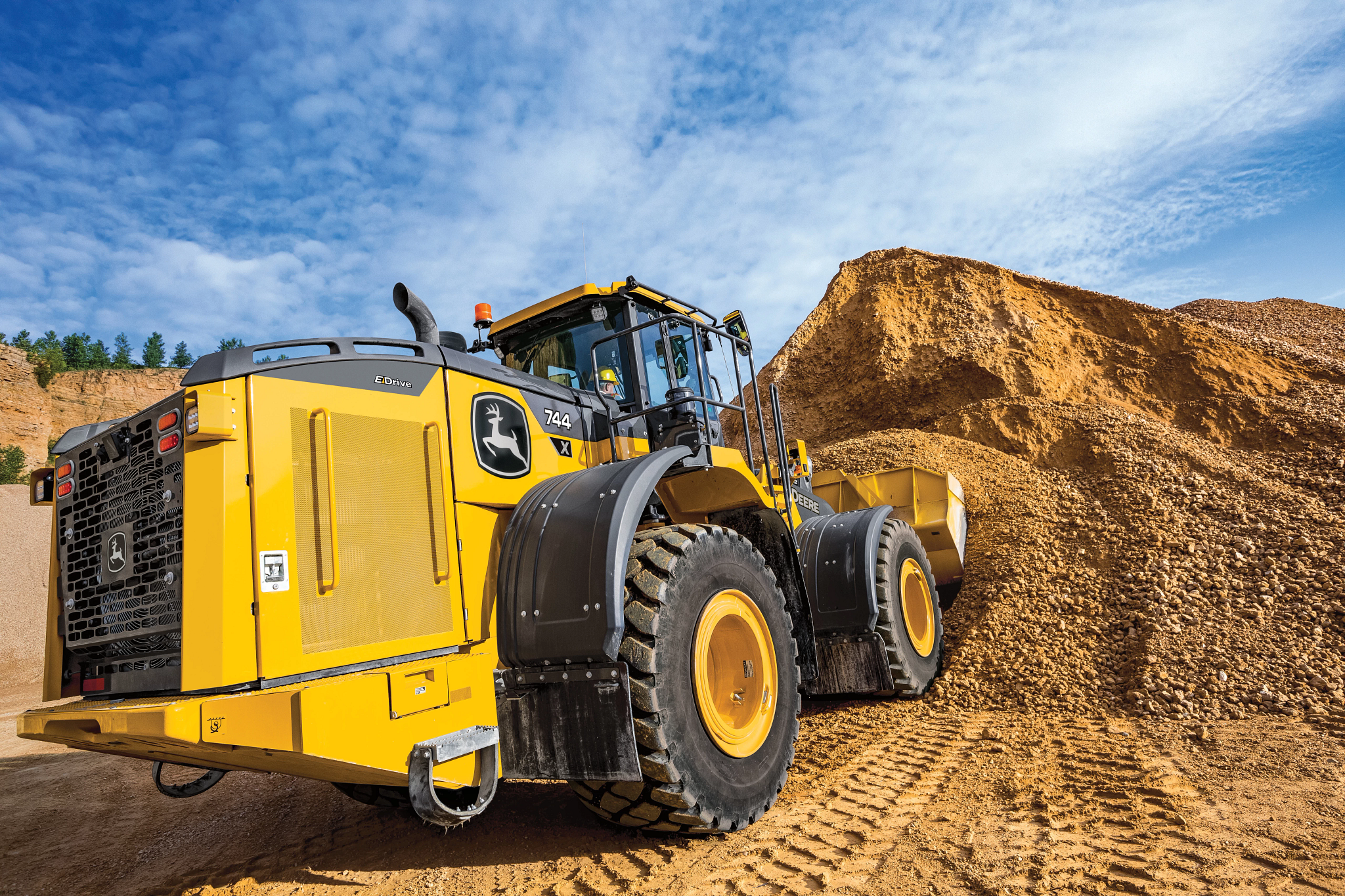 744 X-Tier Wheel Loader moving sand