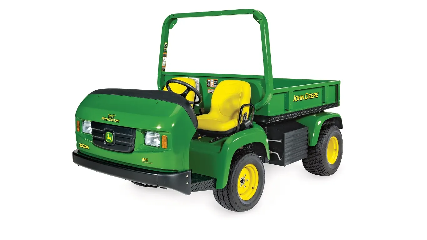 Turf utility vehicle in green and yellow with open cab, high‑back seat and rear cargo bed, designed for golf course transport tasks