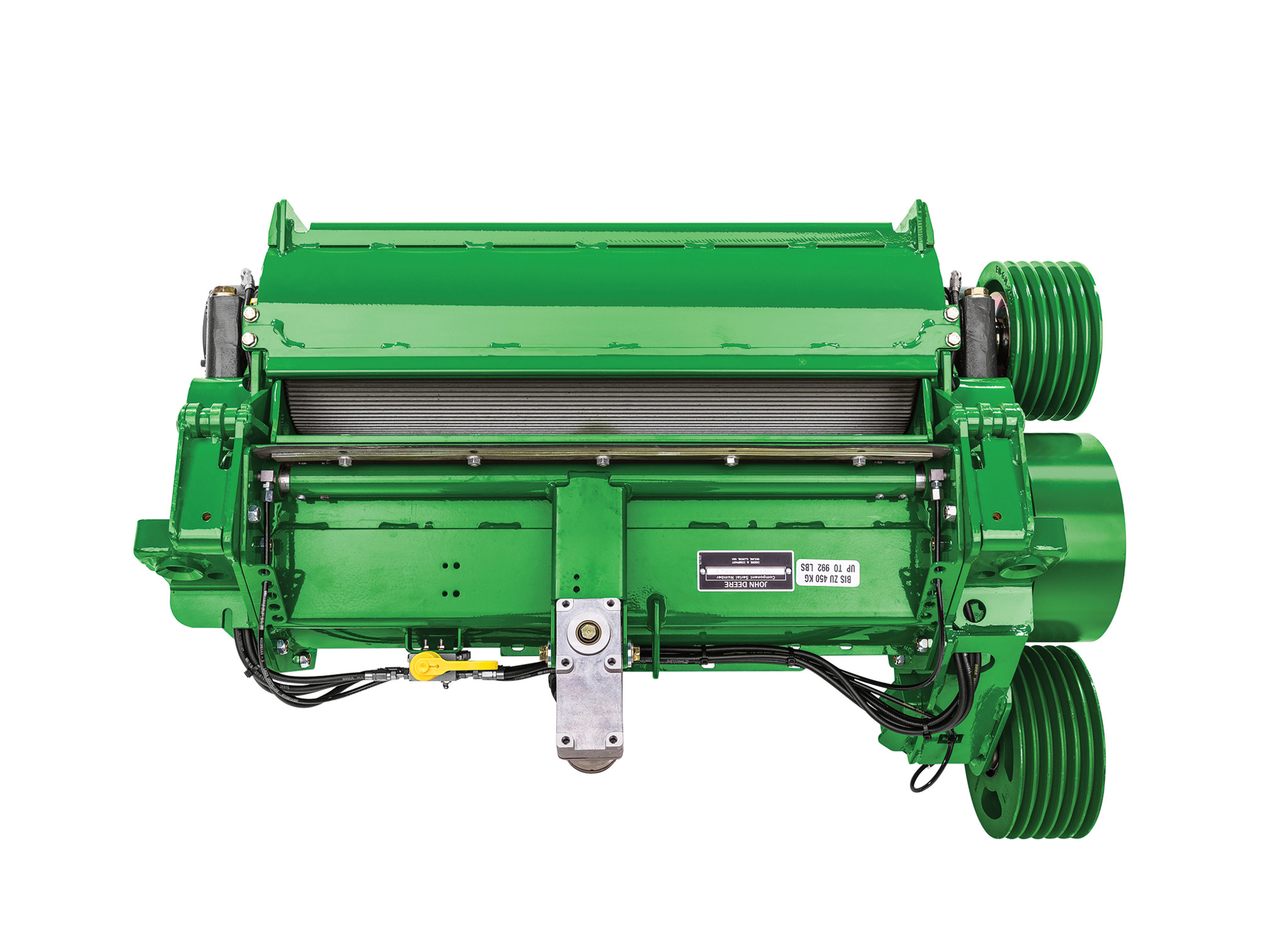 Front view of a green kernel processor with rollers, belts, pulleys, hydraulic lines, and mounting brackets visible against a white background