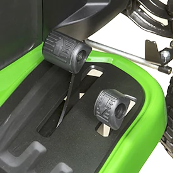 Top right studio view of an S100 series lawn tractor's two-pedal speed/direction controls