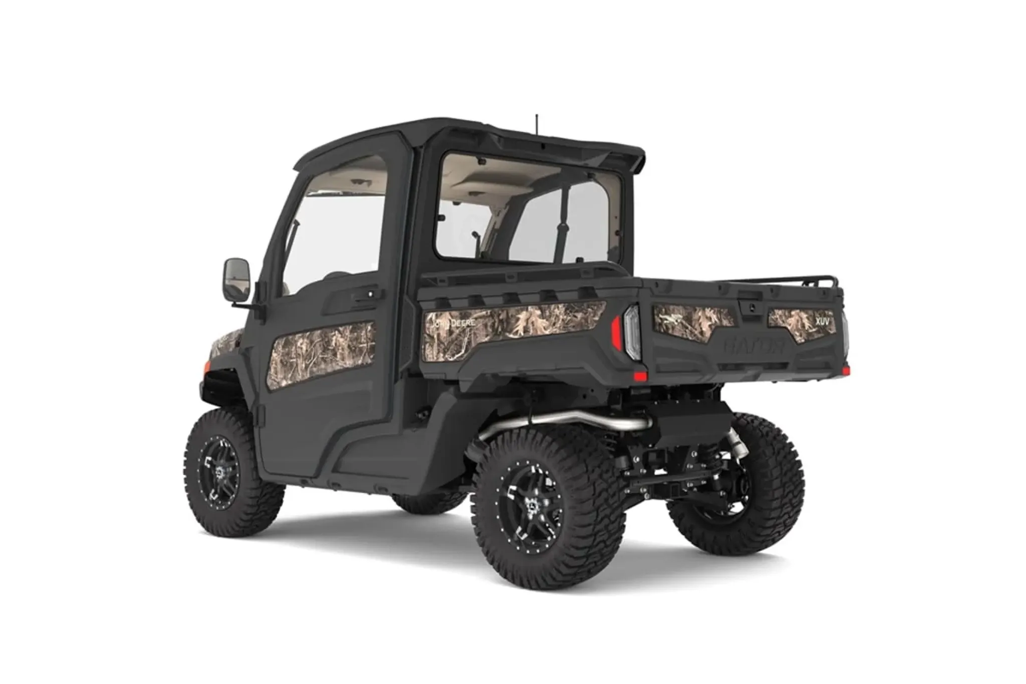 Rear left studio view of XUV 845R Premium Cab in camo