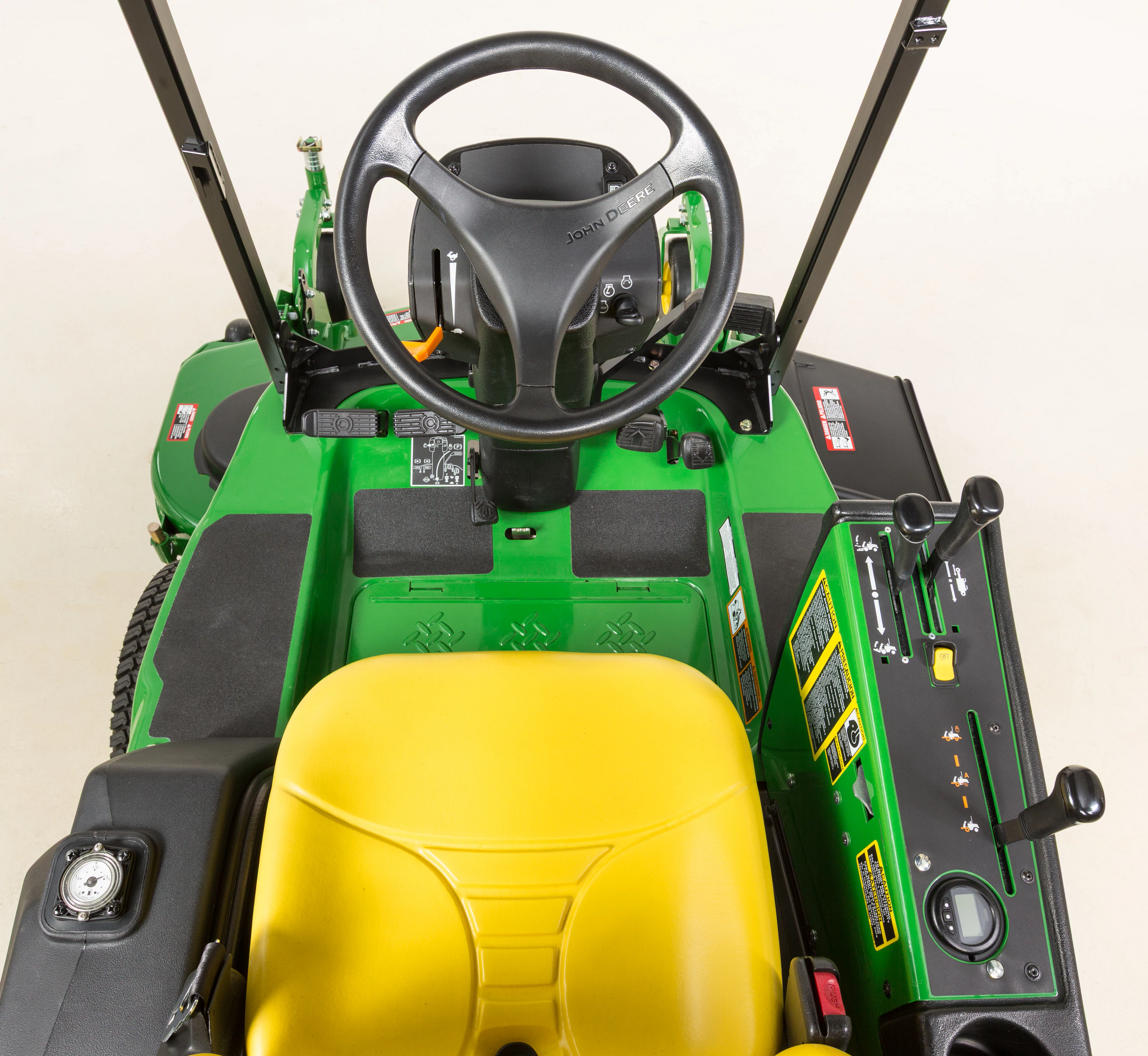 Top studio view of a 1570 TerrainCut™ Front Mower's operator controls