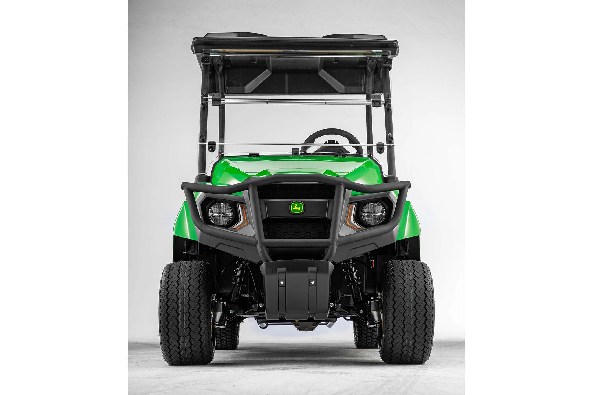 Front studio view of a black and green GS Electric Gator with black shade canopy