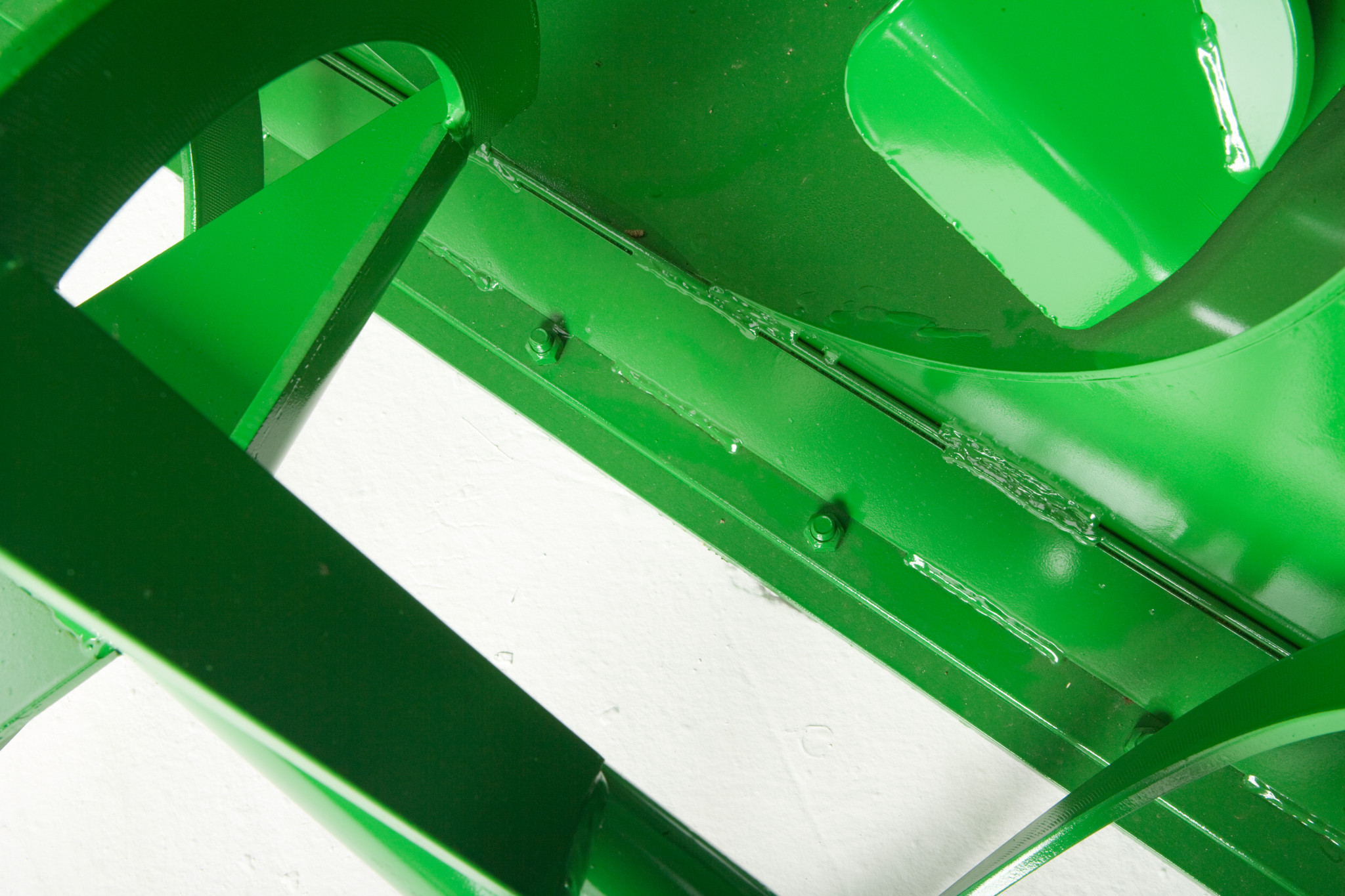 Close-up studio view of cutting edge on SB12 Snowblower