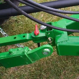 Close-up of a DC1000 disc mower caddy's clevis hitch