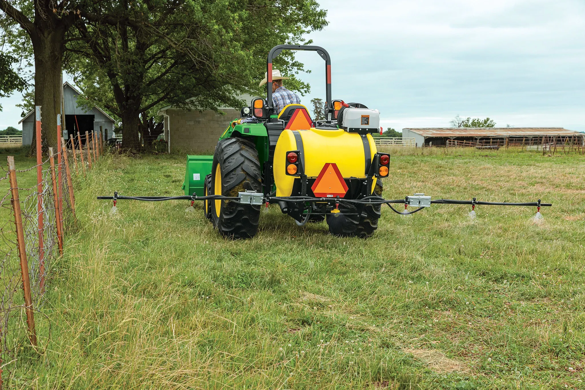 Field view of LS2011 Sprayer on 4066M Tractor in field