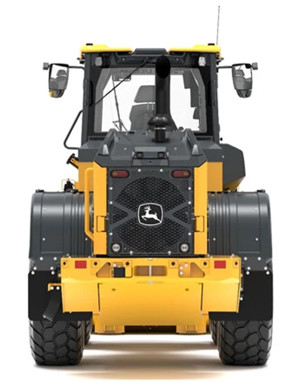 Rear view of a wheel loader, showing large treaded rear tires, enclosed operator cab with mirrors, central exhaust stack, and John Deere logo