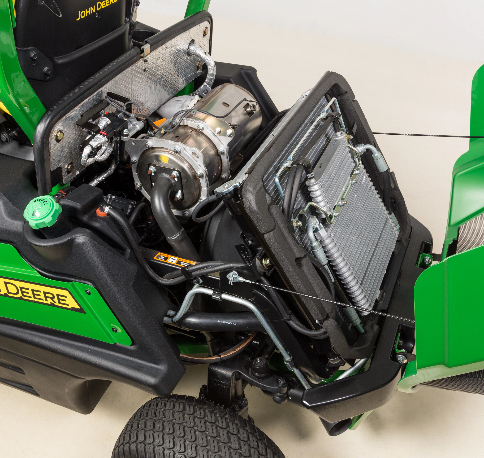 Studio view of a 1500 series TerrainCut™ Front Mower's diesel engine