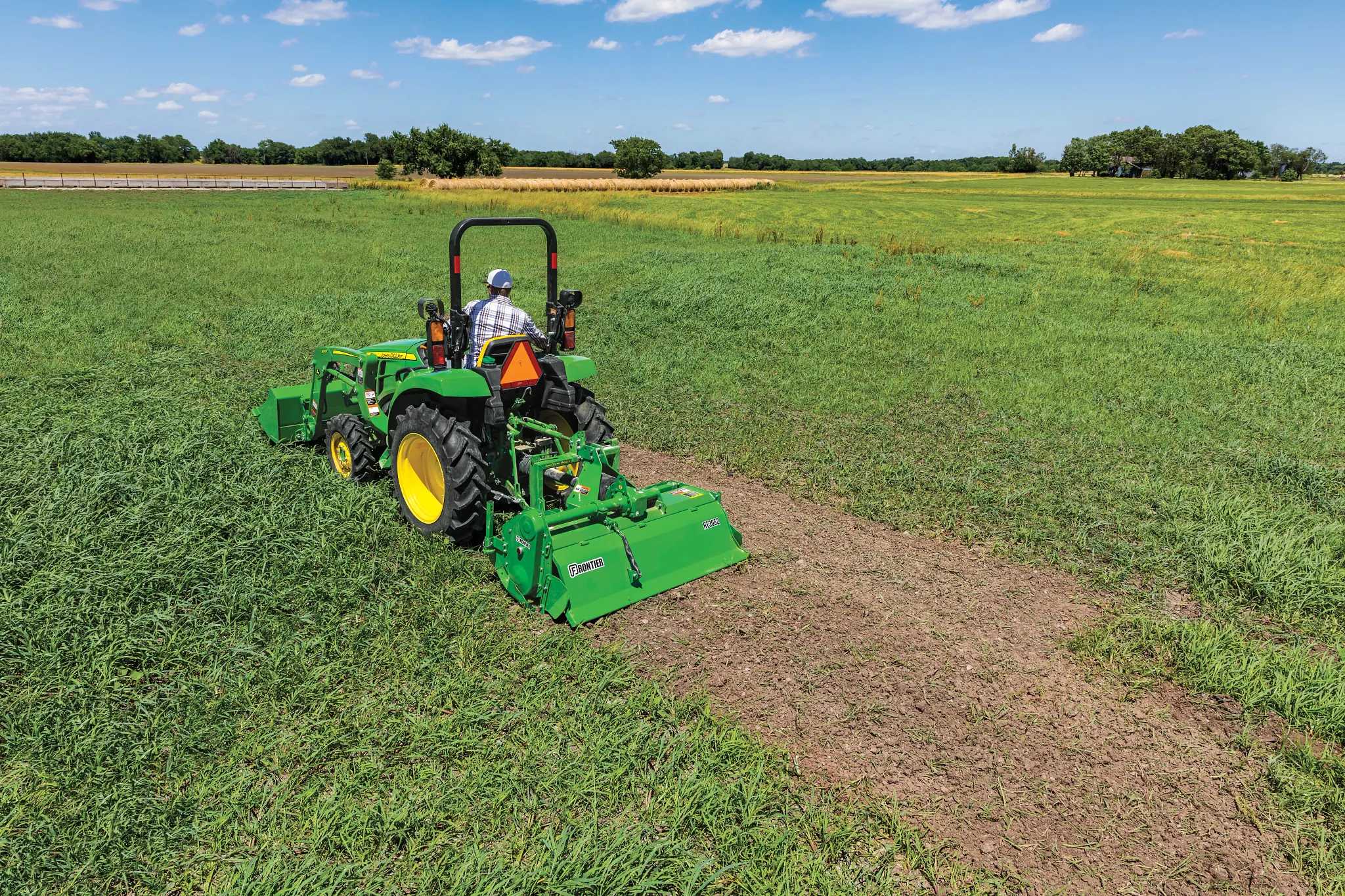 Field view of the RT3062 Rotary Tiller on a Compact Utility Tractor