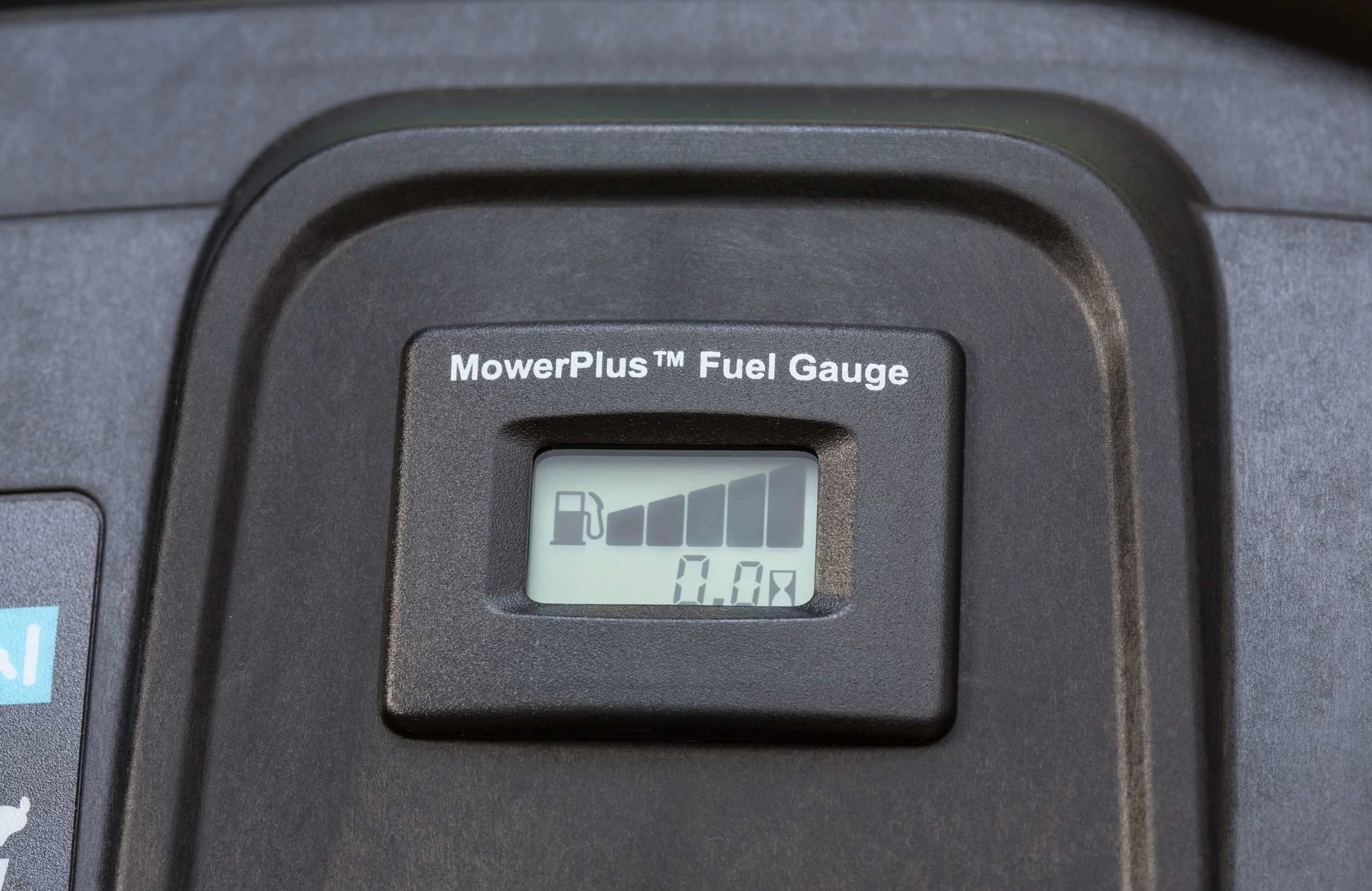 Close-up of the MowerPlus Fuel Gauge on S100 series lawn tractors
