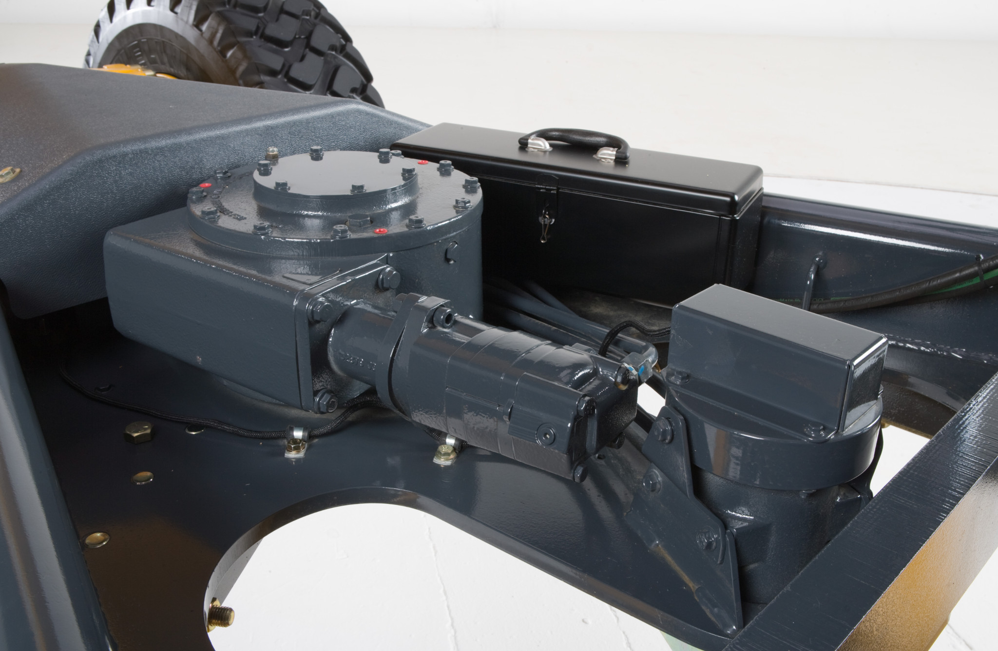 Single input drive with slip clutch on motor grader