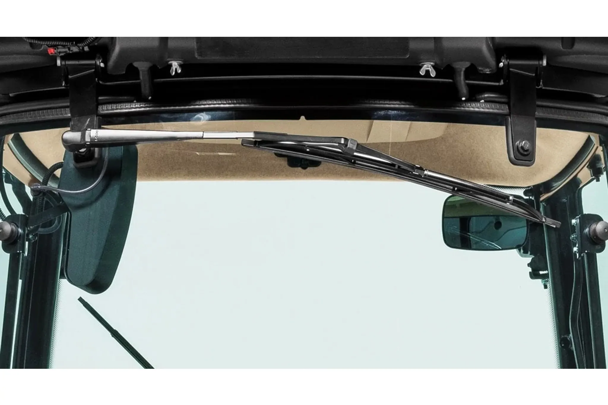 Closeup of a cab windshield with windshield wipers