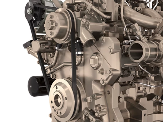 Close-up of an industrial engine showing the front assembly with belts, pulleys, housings, and connected metal components, shown against a white background