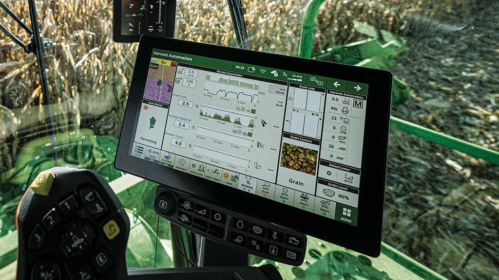 Close-up of a John Deere in-cab display showing precision agriculture data — Koenig Equipment