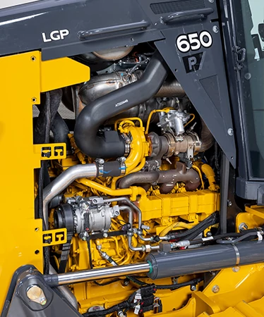 Front view of the uncovered, left engine compartment of a 650 P-Tier Dozer