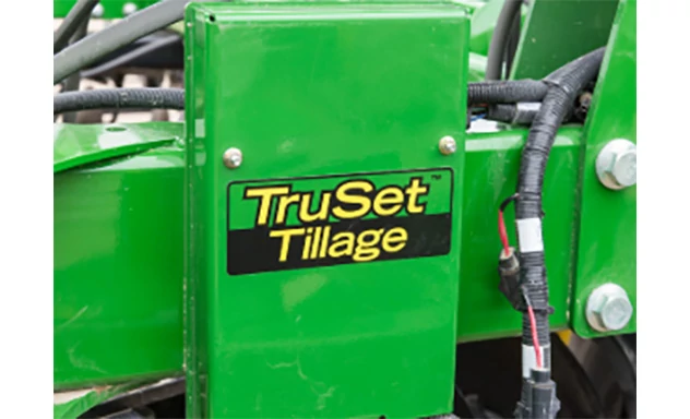 Logo with the words ‘TruSet Tillage’ in bold yellow text on a green and black background