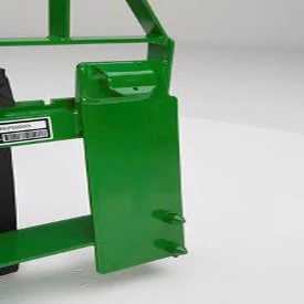 Close-up of a metal loader frame with a rectangular side plate, mounting brackets, and visible bolt points, shown against a plain white background