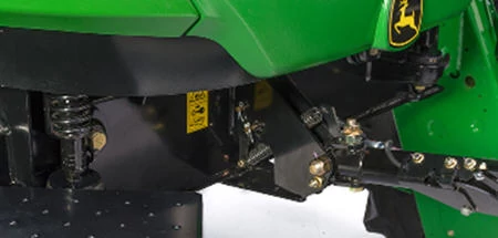 Close-up, rear left studio view of a W170 self-propelled windrower's four-point independent cab suspension