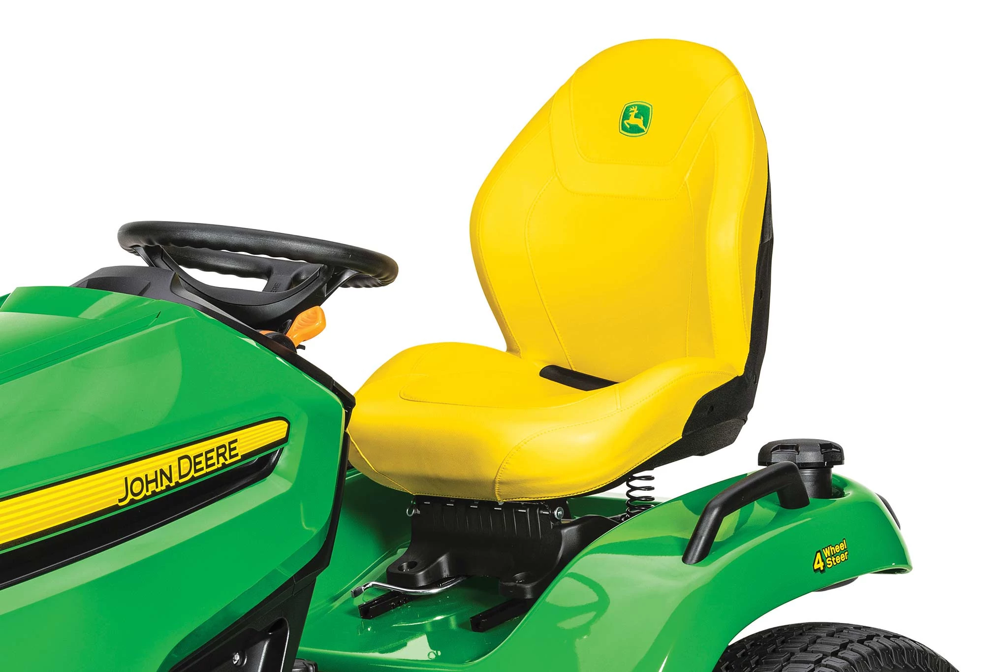Studio close-up of an X584 lawn tractor's operator station, with yellow seat, green fender, and black steering wheel