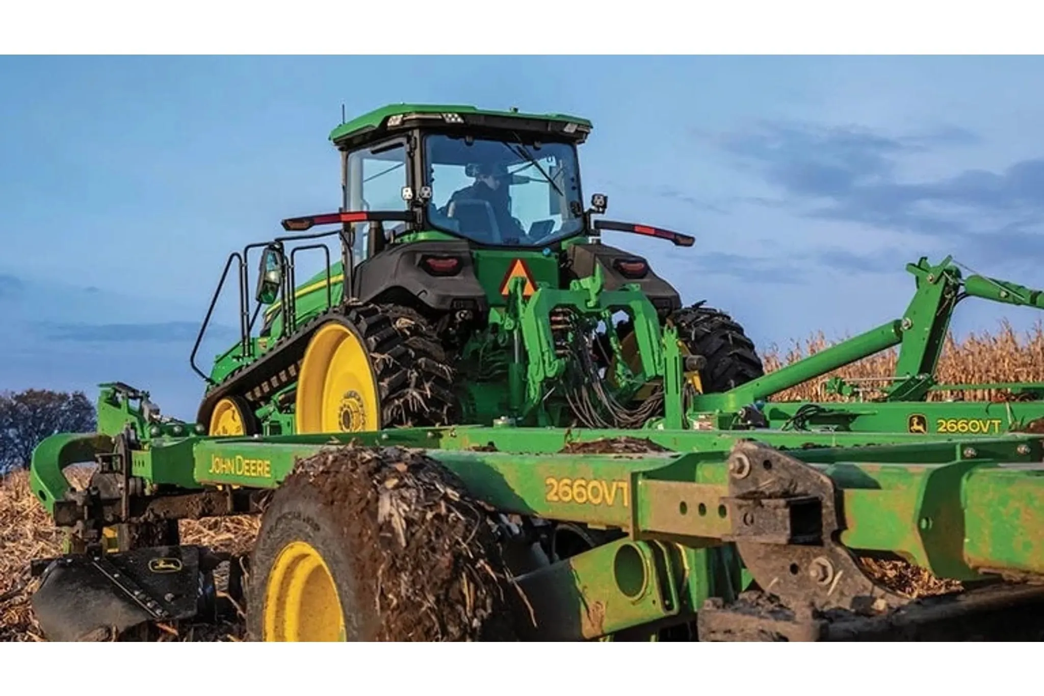 8R 340 Tractor in a corn field