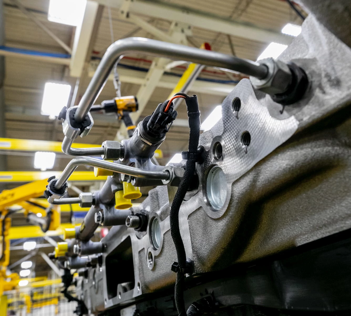 Closeup of fuel lines on John Deere engine