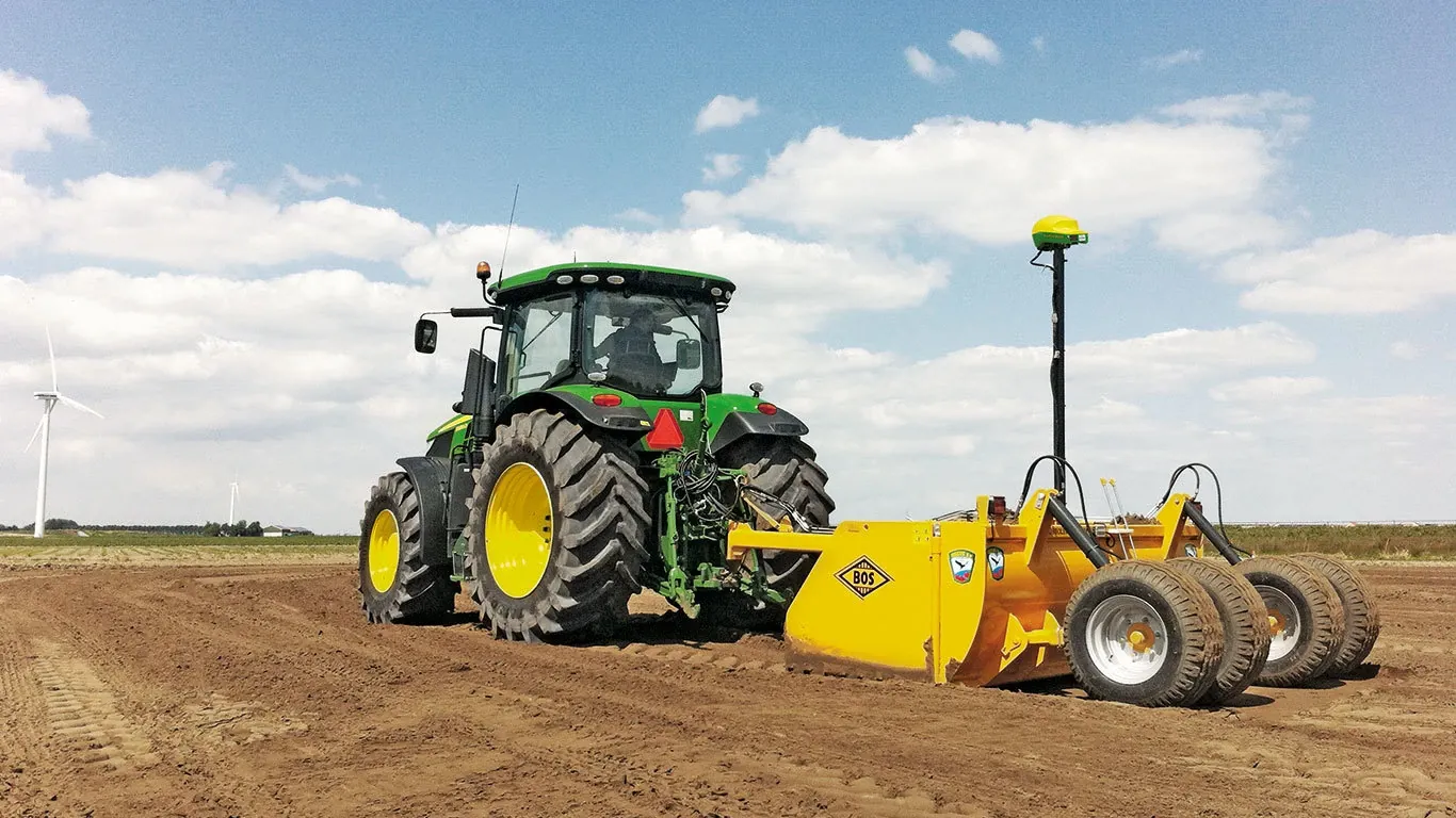 Large Wheel Tractor with iGrade™ Field Implement Action Shot - Rear Left View