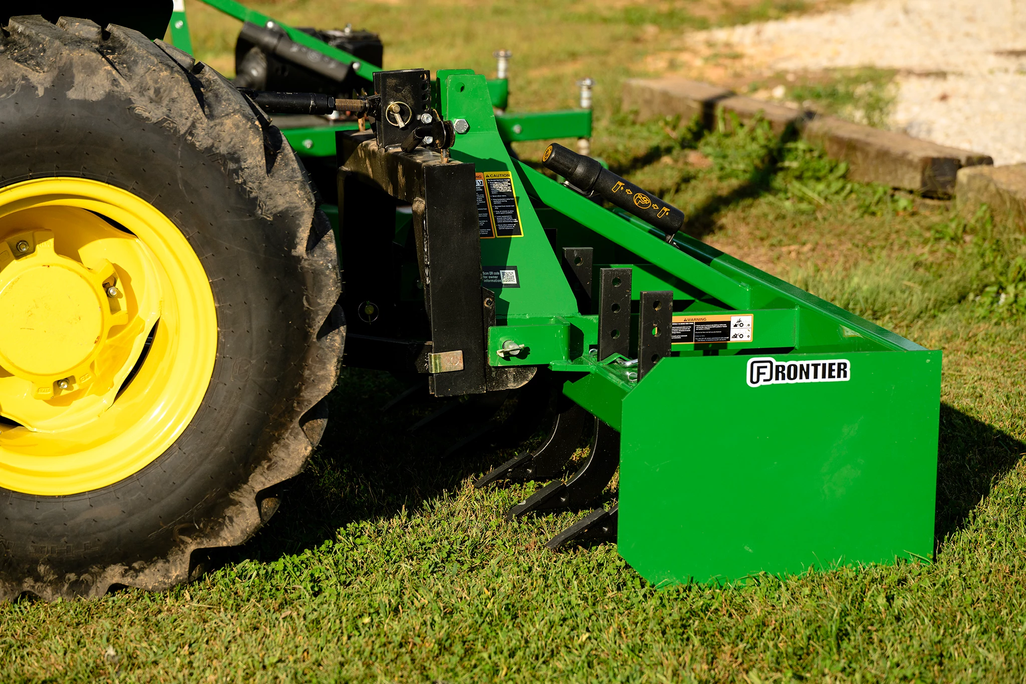 BB5072 Box Blade on back of tractor in grass