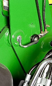 Close-up of the mast pin on the side of a 700M loader