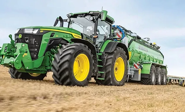 8R410 Large Wheel Tractor With Implement Automation Action Shot - Front Left View