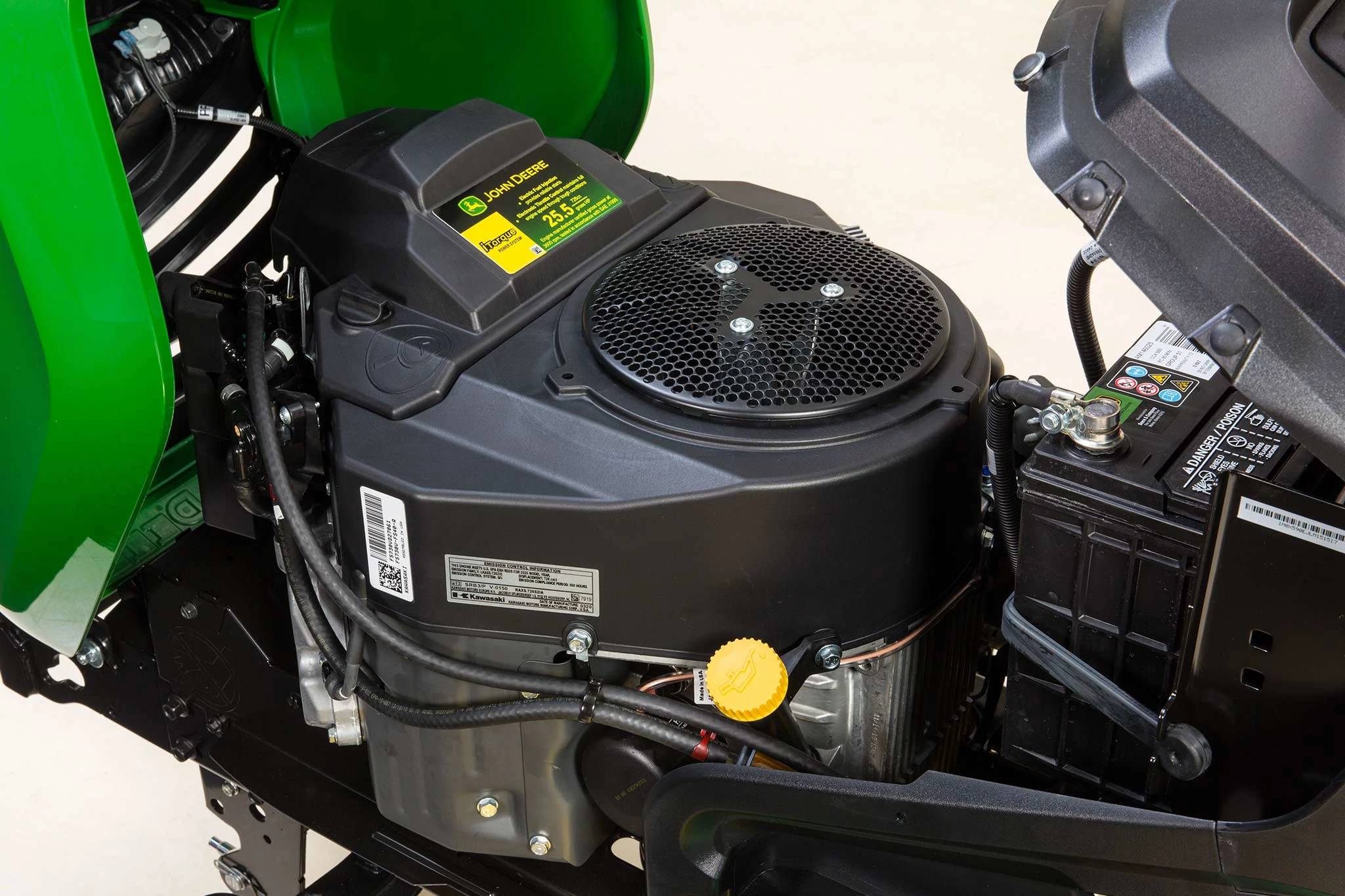 Studio close-up of an X590 Lawn Tractor's uncovered V-Twin Engine