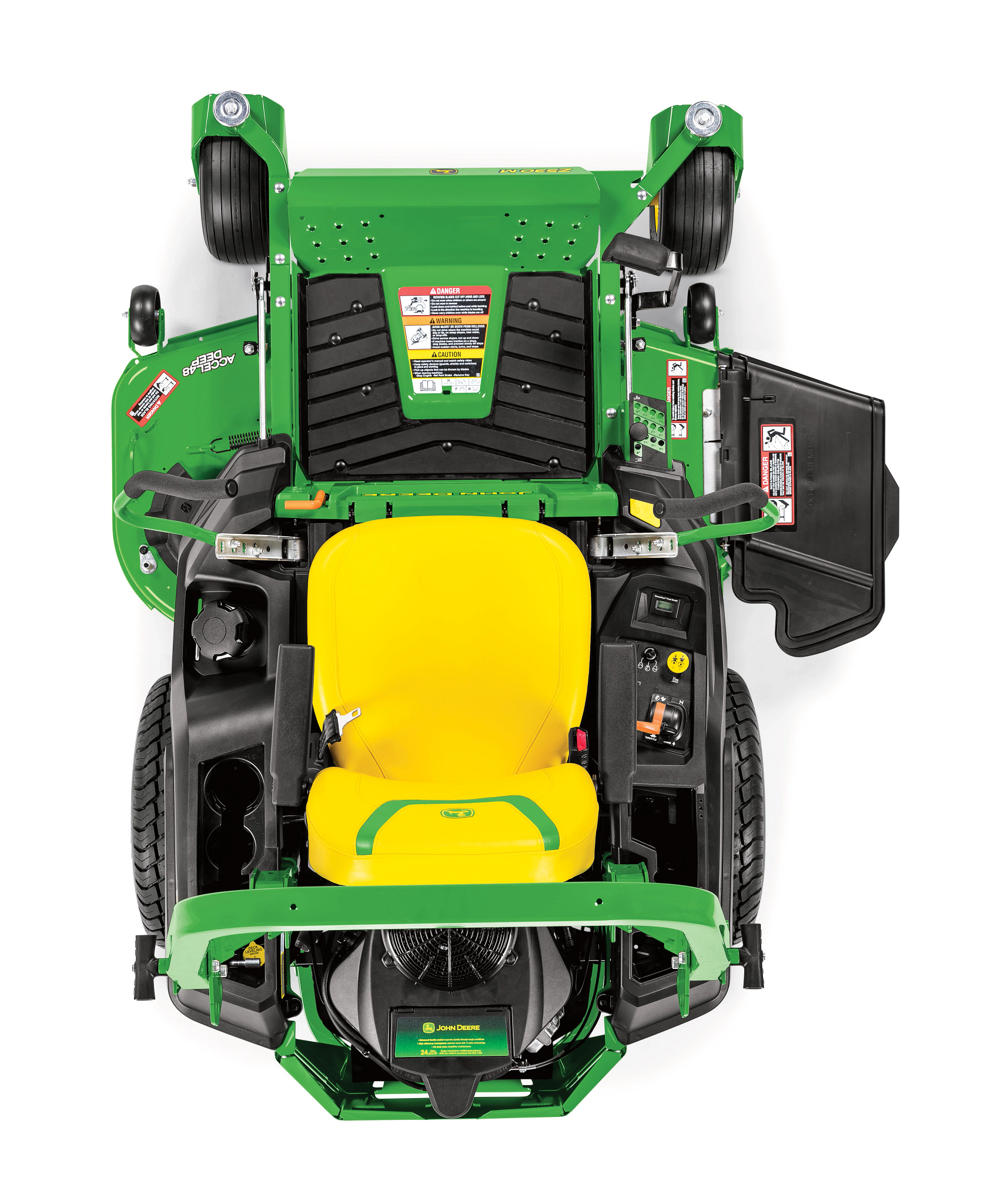Top-down view of a zero-turn mower showing the yellow seat, control levers, foot platform, mower deck, and discharge chute