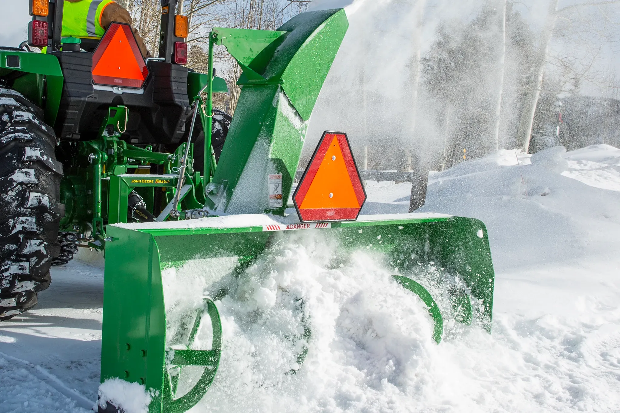 SB1174 Snowblower blowing snow on 4052M Tractor