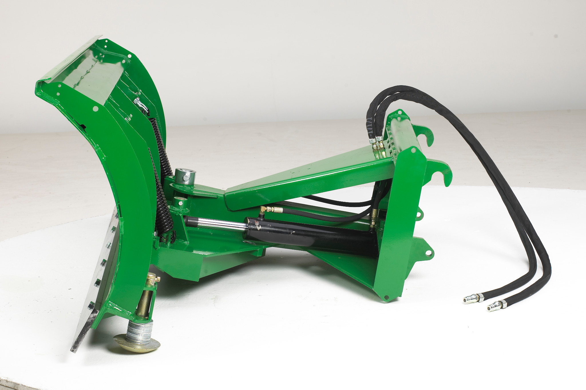 Green hydraulic-powered front blade with a curved blade, mounting brackets, and two hydraulic hoses extending from the frame