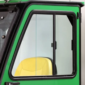 Close-up of the left side, open window of the X700 Signature Series Lawn Tractor Hard Cab