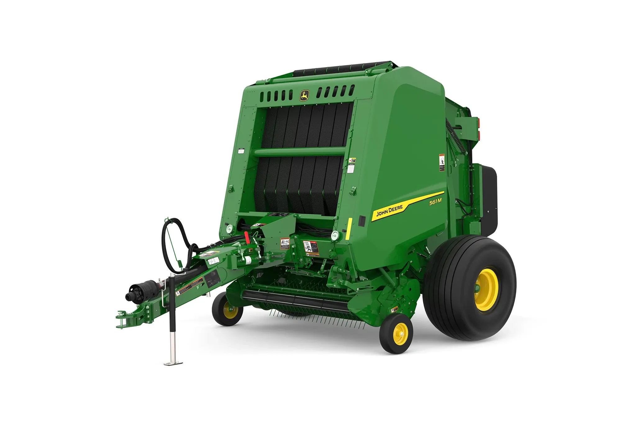Studio rendering of 561M round baler shown from a front three-quarter angle on a white background, featuring a green body, yellow wheels, open pickup assembly, bale chamber opening with visible belts, PTO driveline, and front tow hitch