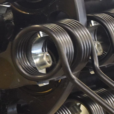 Close-up of the six tine bar pickup reel on a 46R windrow pickup