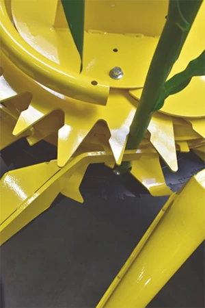 Close-up of a 300 Pro rotary crop header's yellow intake fingers