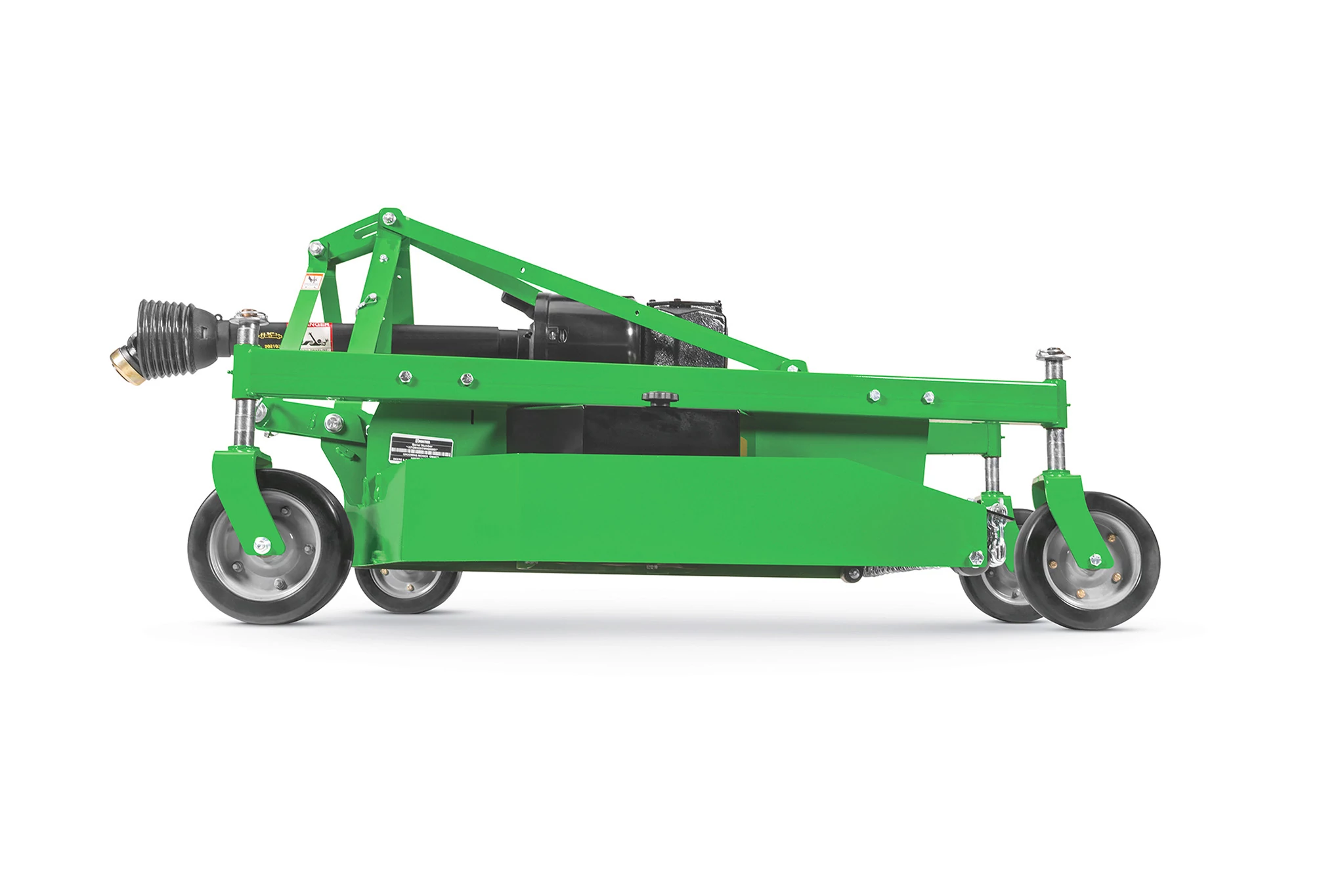 Green grooming mower shown from the side, featuring caster wheels, a PTO driveline, and a rectangular mower deck