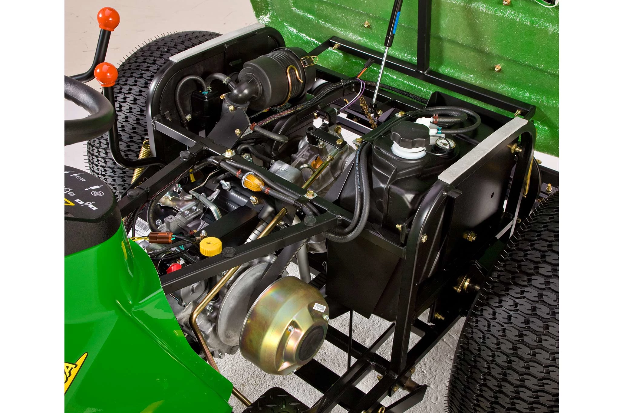 Front left studio view of a bunker and field rake's uncovered drive system