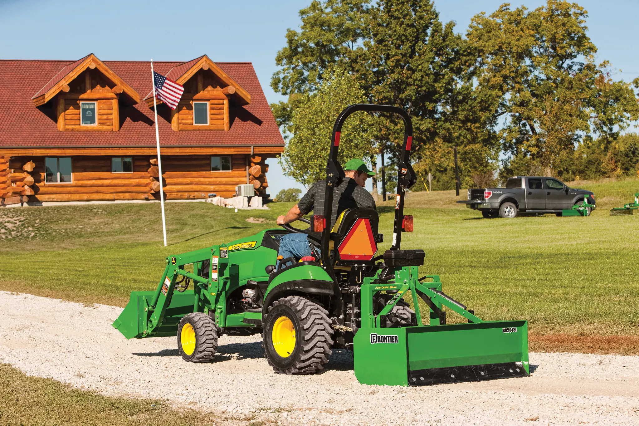 1026R Tractor with BB5048L Box Blade on a gravel drive