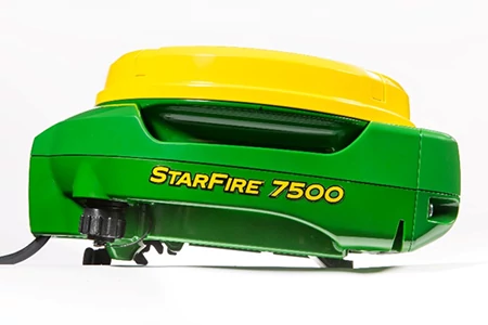 StarFire 7500 receiver in green and yellow housing shown from a side angle on a white background