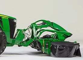 Studio side right view of the nose of an 8R tractor with front hitch attached to an F300R front-mounted mower
