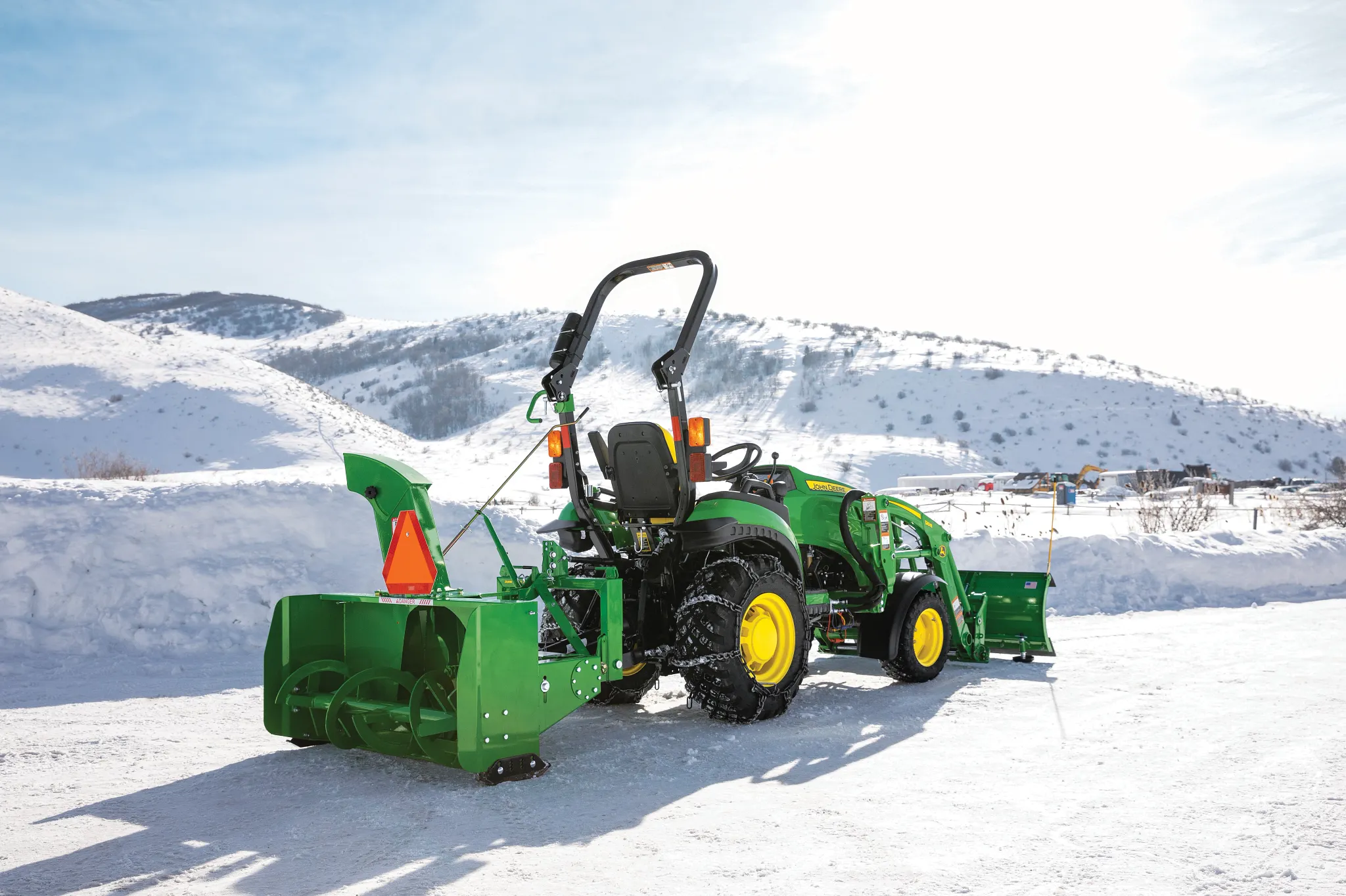 SB1154 Snowblower on 2025R Tractor in a snow covered field
