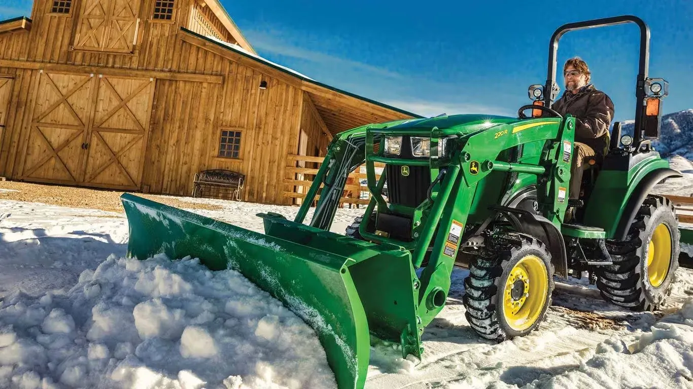 AF11E Series Front Blade clearing snow