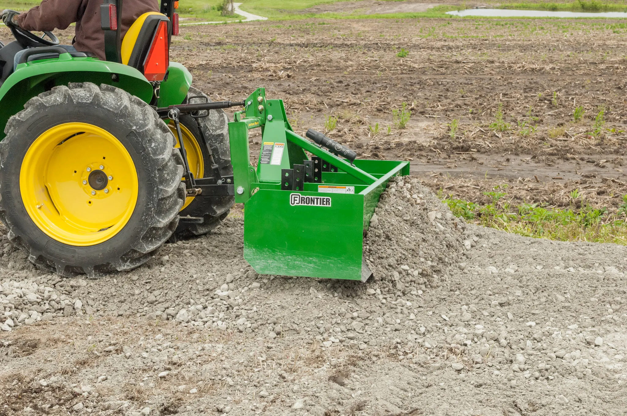 BB5072 Box Blade on utility tractor pushing gravel
